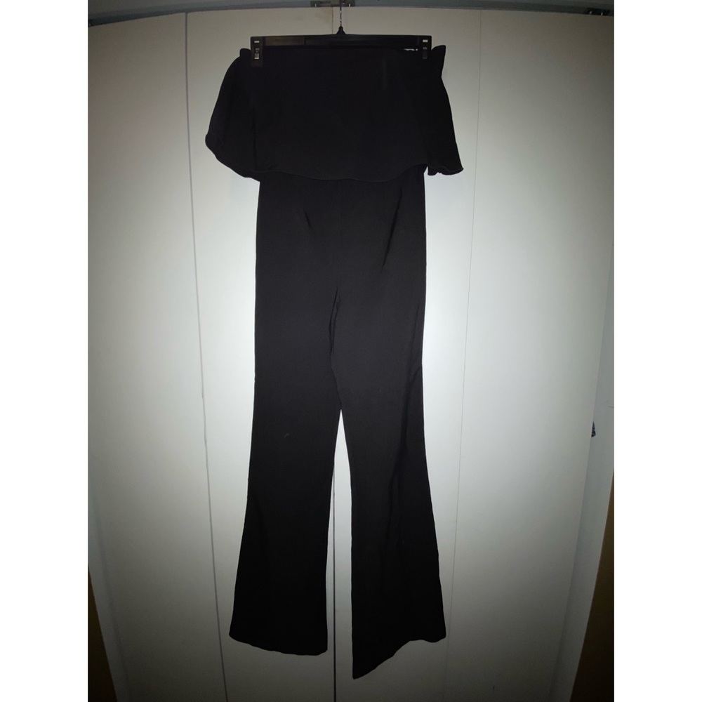 Black ruffled jumpsuit sleeveless